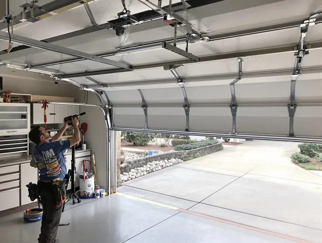 Garage door track repair service by New Milford Garage Door Repair in New Milford